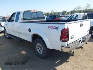 1997 Ford F-150 XL with VIN 1FTDX18W6VNB27227, listed as a IAAI auction lot 41858395 with 174,888 mi miles. Bid and sale history available at carsss.com. Image 3.