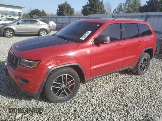 2017 Jeep Grand Cherokee Trailhawk with VIN 1C4RJFLT0HC667691, listed as a Copart auction lot 42041705 with 129,757 mi miles and Salvage title. Bid and sale history available at DreamBid. Image 1.