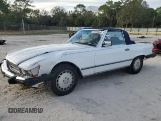 1988 Mercedes-Benz 560 SL with VIN WDBBA48D7JA082792, listed as a Copart auction lot 86698654 with 81,335 mi miles and Salvage Title. Bid and sale history available at DreamBid. Image 1.