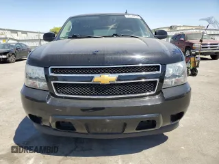 2014 Chevrolet Suburban LS with VIN 1GNSCHE03ER132039, listed as a Copart auction lot 68390234 with 129,744 mi miles and Salvage Title. Bid and sale history available at carsss.com. Image 5.