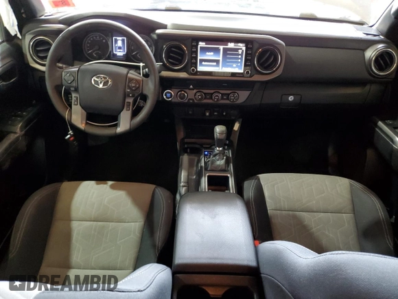 2020 Toyota Tacoma SR5 z VIN 5TFCZ5AN7LX222217, wystawiony jako Copart lot #45892765 z przebiegiem 79 098 mil mil oraz Szkoda całkowita • Salvage title. Historia ofert i sprzedaży dostępna na DreamBid. Obrazek 8.