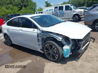 2019 Ford Fusion Titanium z VIN 3FA6P0D99KR124159, wystawiony jako IAAI lot #42622690 z przebiegiem 118 763 mil mil oraz . Historia ofert i sprzedaży dostępna na DreamBid. Obrazek 1.