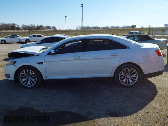 2014 Ford Taurus Limited with VIN 1FAHP2F89EG155934, listed as a IAAI auction lot 41760703 with 130,280 mi miles. Bid and sale history available at carsss.com. Image 15.
