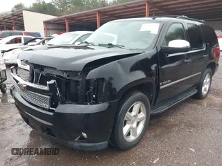 2009 Chevrolet Tahoe LTZ z VIN 1GNFC33J19R282480, wystawiony jako IAAI lot #41536774 z przebiegiem 118 831 mil mil oraz . Historia ofert i sprzedaży dostępna na DreamBid. Obrazek 2.