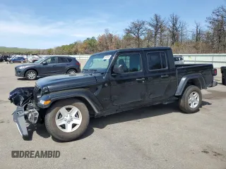 2023 Jeep Gladiator Sport S с VIN 1C6HJTAG0PL501225, выставлен на аукционе Copart как лот 55105535 с пробегом 18 687 миль миль и Списание • Salvage title. История ставок и продаж доступна на DreamBid. Изображение 1.