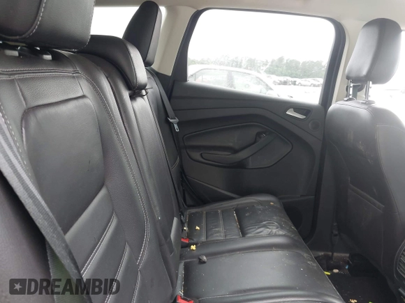 2018 Ford Escape Titanium with VIN 1FMCU0J99JUA12717, listed as a IAAI auction lot 42237509 with 123,896 mi miles and . Bid and sale history available at DreamBid. Image 8.