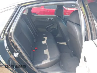 2023 Honda Civic Sport with VIN 2HGFE2F58PH557787, listed as a IAAI auction lot 42207827 with 51,885 mi miles and . Bid and sale history available at DreamBid. Image 8.