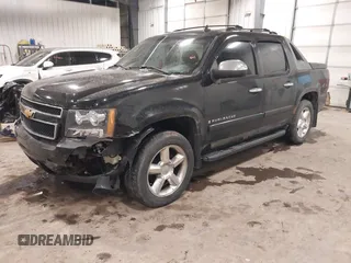 2007 Chevrolet Avalanche LTZ with VIN 3GNFK12327G236731, listed as a IAAI auction lot 41707271 with 243,088 mi miles. Bid and sale history available at carsss.com. Image 2.