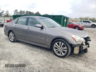 2010 Infiniti M with VIN JN1CY0AP4AM910541, listed as a Copart auction lot 50558175 with 249,167 mi miles and Salvage Title. Bid and sale history available at carsss.com. Image 4.