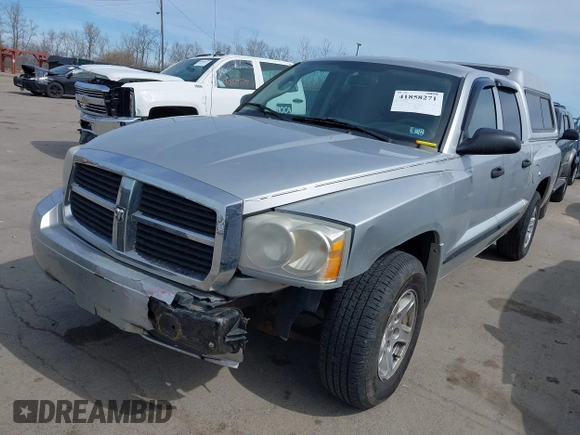 2007 Dodge Dakota SLT with VIN 1D7HE48K57S147503, listed as a IAAI auction lot 41858271 with 242,534 mi miles and . Bid and sale history available at DreamBid. Image 2.