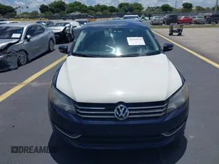 2014 Volkswagen Passat S with VIN 1VWAP7A30EC025369, listed as a IAAI auction lot 42525534 with 169,000 mi miles and . Bid and sale history available at DreamBid. Image 12.