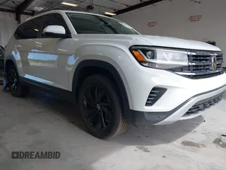 2023 Volkswagen Atlas SE with VIN 1V2WR2CA4PC555542, listed as a IAAI auction lot 42244765 with 14,248 mi miles and . Bid and sale history available at DreamBid. Image 1.