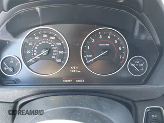 2014 BMW 3 Series 328i with VIN WBA3C1C54EK112620, listed as a IAAI auction lot 42712414 with 169,297 mi miles and . Bid and sale history available at DreamBid. Image 7.