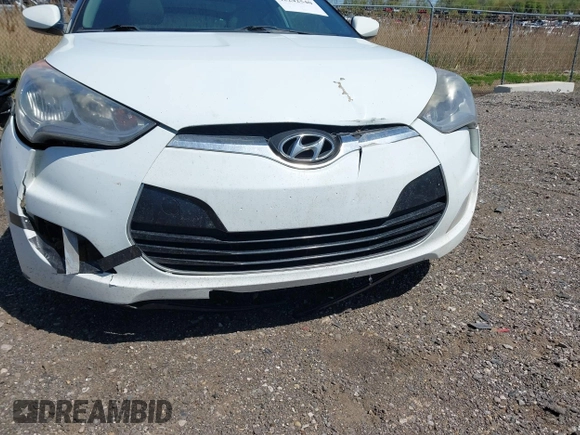 2013 Hyundai Veloster w/Gray Int with VIN KMHTC6AD1DU165476, listed as a IAAI auction lot 42242540 with 201,732 mi miles and . Bid and sale history available at DreamBid. Image 6.