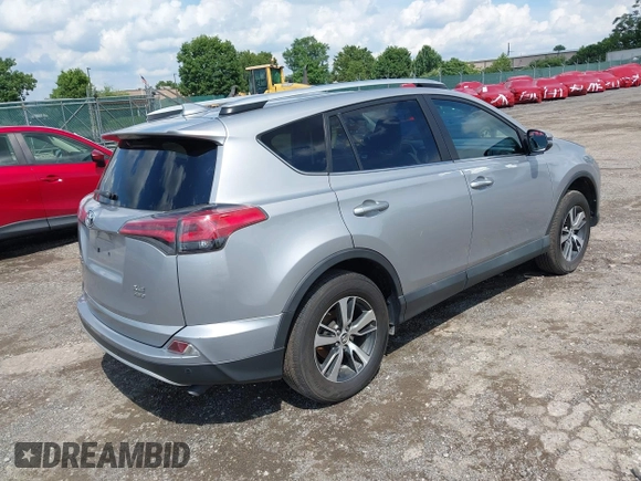 2016 Toyota RAV4 XLE with VIN 2T3RFREV1GW425957, listed as a IAAI auction lot 42648437 with 58,654 mi miles and . Bid and sale history available at DreamBid. Image 4.