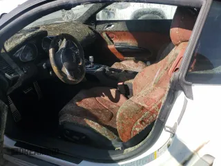 2011 Audi R8 5.2L z VIN WUAANAFG8BN000143, wystawiony jako Copart lot #74799504 z przebiegiem Nie podano mil oraz Szkoda całkowita • Salvage title. Historia ofert i sprzedaży dostępna na DreamBid. Obrazek 7.