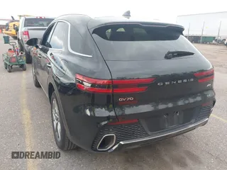 2025 Genesis GV70 2.5T with VIN KMUMADTB7SU199933, listed as a IAAI auction lot 42500513 with 15,384 mi miles and . Bid and sale history available at DreamBid. Image 3.