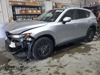 2021 Mazda CX-5 Touring with VIN JM3KFBCM7M0467530, listed as a Copart auction lot 42238385 with 33,277 mi miles and Salvage Title. Bid and sale history available at carsss.com. Image 1.