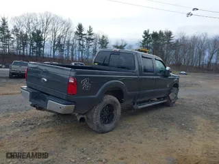 2015 Ford Super Duty F-250 SRW Lariat with VIN 1FT7W2BT5FEB50696, listed as a IAAI auction lot 41406626 with 106,993 mi miles. Bid and sale history available at carsss.com. Image 4.