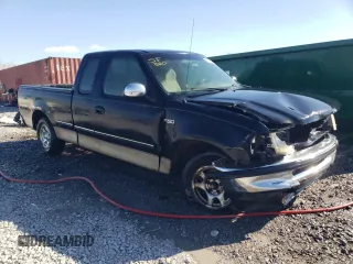 1997 Ford F-150 with VIN 1FTDX1722VNB96527, listed as a Copart auction lot 87304814 with 106,771 mi miles and Salvage title. Bid and sale history available at DreamBid. Image 4.