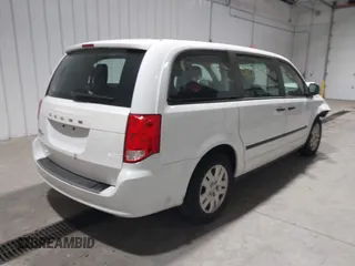2016 Dodge Grand Caravan SE with VIN 2C4RDGBG1GR392484, listed as a IAAI auction lot 41663549 with 126,882 mi miles and . Bid and sale history available at DreamBid. Image 4.