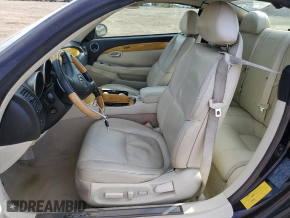 2004 Lexus SC 430 z VIN JTHFN48Y640056039, wystawiony jako Copart lot #48590735 z przebiegiem 117 295 mil mil oraz Szkoda całkowita • Salvage title. Historia ofert i sprzedaży dostępna na DreamBid. Obrazek 7.