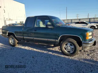 1995 GMC Sierra 1500 z VIN 2GTEK19K6S1580355, wystawiony jako Copart lot #87416254 z przebiegiem 162 829 mil mil oraz Szkody całkowita. Historia ofert i sprzedaży dostępna na DreamBid. Obrazek 4.