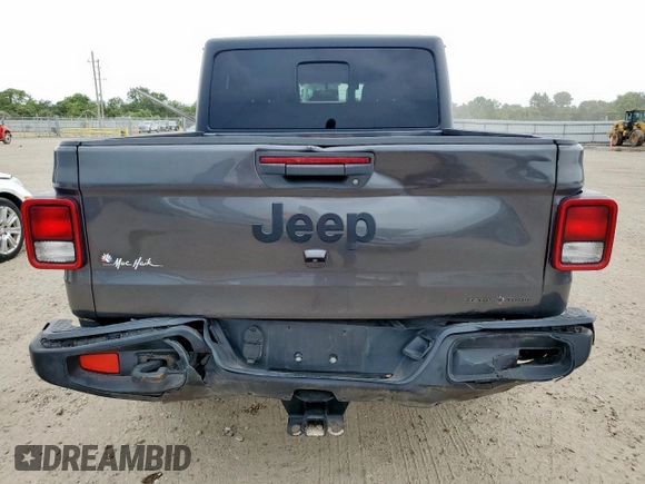 2021 Jeep Gladiator Willys с VIN 1C6HJTAG9ML606731, выставлен на аукционе Copart как лот 59873205 с пробегом 84 811 миль миль и Списание • Salvage title. История ставок и продаж доступна на DreamBid. Изображение 6.