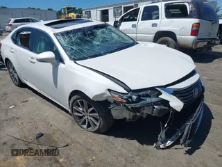 2018 Lexus ES 300h with VIN JTHBW1GG3J2185097, listed as a IAAI auction lot 42526276 with 116,660 mi miles and . Bid and sale history available at DreamBid. Image 1.