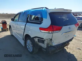 2011 Toyota Sienna XLE AAS with VIN 5TDYK3DCXBS126143, listed as a IAAI auction lot 41663238 with 154,238 mi miles. Bid and sale history available at carsss.com. Image 3.