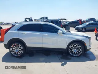 2024 Cadillac XT4 AWD Premium Luxury with VIN 1GYFZDR40RF100102, listed as a IAAI auction lot 41987175 with 4,935 mi miles and . Bid and sale history available at DreamBid. Image 13.