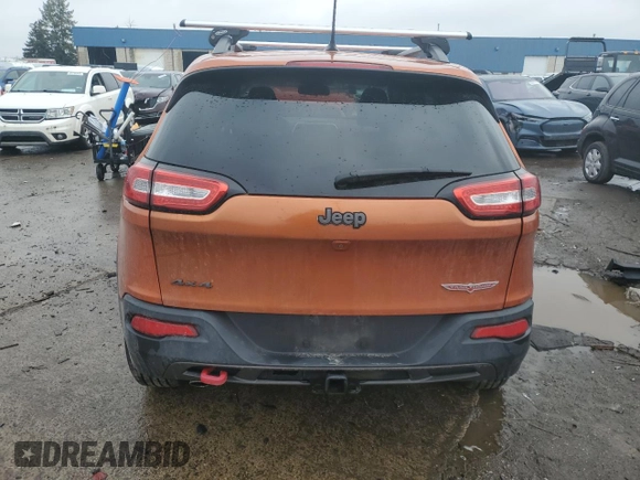 2014 Jeep Cherokee Trailhawk with VIN 1C4PJMBB4EW317799, listed as a Copart auction lot 46779095 with 95,832 mi miles and Clean Title. Bid and sale history available at carsss.com. Image 6.
