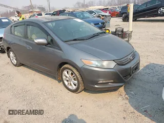 2010 Honda Insight EX with VIN JHMZE2H75AS027964, listed as a IAAI auction lot 41889301 with 136,485 mi miles and . Bid and sale history available at carsss.com. Image 1.