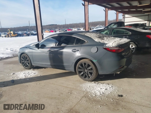 2021 Mazda 6 Carbon Edition with VIN JM1GL1WY6M1616617, listed as a IAAI auction lot 41365615 with 60,747 mi miles and . Bid and sale history available at DreamBid. Image 14.