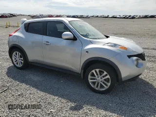2013 Nissan Juke S with VIN JN8AF5MV7DT214627, listed as a Copart auction lot 50793025 with 130,500 mi miles and Salvage Title. Bid and sale history available at DreamBid. Image 4.