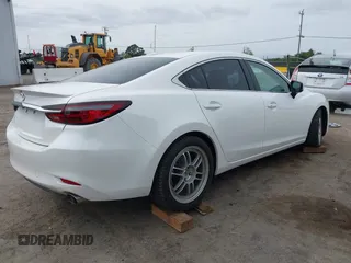 2018 Mazda 6 Grand Touring Reserve with VIN JM1GL1WYXJ1300116, listed as a IAAI auction lot 42088015 with 57,760 mi miles and . Bid and sale history available at DreamBid. Image 4.