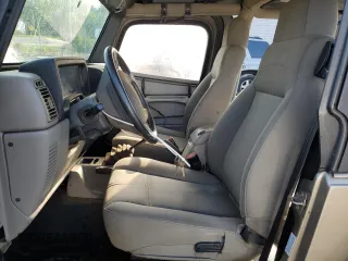 2003 Jeep Wrangler Sahara with VIN 1J4FA59S83P318057, listed as a Copart auction lot 58781495 with 102,571 mi miles and Clean title. Bid and sale history available at DreamBid. Image 7.