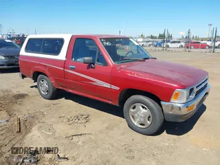 1992 Toyota Pickup DLX z VIN 4TARN81PXNZ030799, wystawiony jako IAAI lot #41879500 z przebiegiem 221 198 mil mil oraz . Historia ofert i sprzedaży dostępna na DreamBid. Obrazek 1.