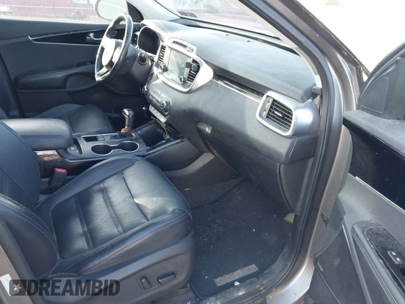 2016 Kia Sorento SX with VIN 5XYPKDA51GG031823, listed as a IAAI auction lot 42142495 with 87,132 mi miles. Bid and sale history available at carsss.com. Image 5.