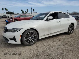2019 BMW 3 Series 330i with VIN WBA5R1C57KAK09187, listed as a Copart auction lot 45050205 with 0 mi miles and Salvage Title. Bid and sale history available at carsss.com. Image 1.