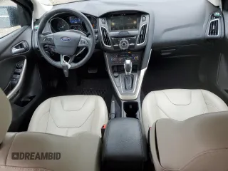 2018 Ford Focus Titanium z VIN 1FADP3N21JL295883, wystawiony jako Copart lot #59051015 z przebiegiem 43 284 mil mil oraz Szkoda całkowita • Salvage title. Historia ofert i sprzedaży dostępna na DreamBid. Obrazek 8.