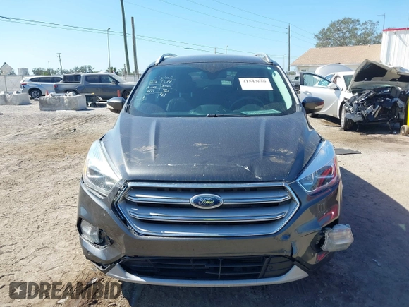 2018 Ford Escape Titanium with VIN 1FMCU0J99JUB09562, listed as a IAAI auction lot 41547659 with 63,700 mi miles and . Bid and sale history available at DreamBid. Image 12.