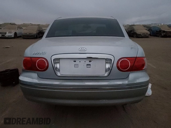 2005 Kia Amanti z VIN KNALD124655077857, wystawiony jako Copart lot #83788734 z przebiegiem Nie podano mil oraz Szkoda całkowita • Salvage title. Historia ofert i sprzedaży dostępna na DreamBid. Obrazek 6.