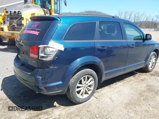 2015 Dodge Journey SXT with VIN 3C4PDDBG1FT701081, listed as a IAAI auction lot 42041392 with 199,683 mi miles and . Bid and sale history available at DreamBid. Image 4.