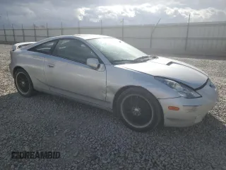 2000 Toyota Celica GTS with VIN JTDDY32T7Y0026545, listed as a Copart auction lot 44401055 with 238,193 mi miles and Salvage Title. Bid and sale history available at carsss.com. Image 4.