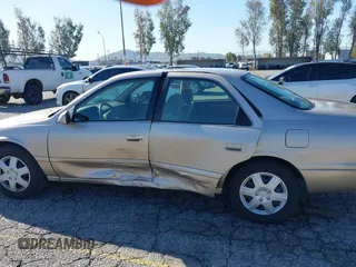 2001 Toyota Camry CE with VIN JT2BG22KX10559757, listed as a IAAI auction lot 41823719 with 72,775 mi miles. Bid and sale history available at carsss.com. Image 6.
