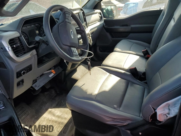 2021 Ford F-150 XL with VIN 1FTMF1CP5MKF10546, listed as a Copart auction lot 50216635 with Not provided miles and Salvage title. Bid and sale history available at DreamBid. Image 7.