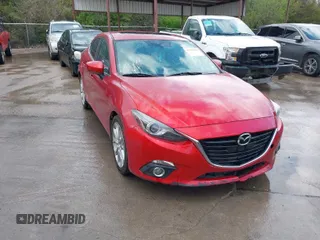 2014 Mazda 3 S Grand Touring with VIN JM1BM1W33E1125838, listed as a IAAI auction lot 41723303 with 185,924 mi miles and . Bid and sale history available at DreamBid. Image 1.