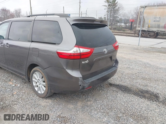 2015 Toyota Sienna Limited z VIN 5TDDK3DC6FS128167, wystawiony jako IAAI lot #41699588 z przebiegiem 179 723 mil mil oraz . Historia ofert i sprzedaży dostępna na DreamBid. Obrazek 3.