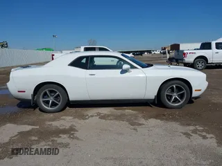 2011 Dodge Challenger z VIN 2B3CJ4DG5BH602787, wystawiony jako IAAI lot #41759684 z przebiegiem 128 055 mil mil oraz . Historia ofert i sprzedaży dostępna na DreamBid. Obrazek 13.